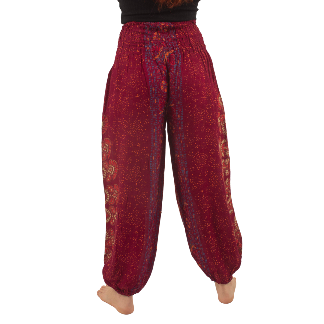 Pantalon Priya Burdeo con naranjo